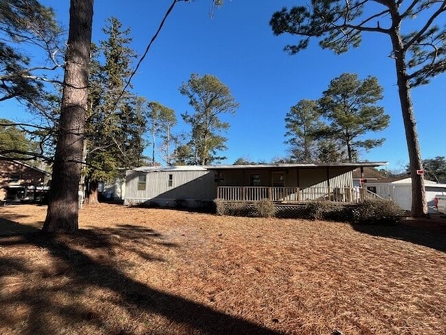 Photo - Welcome to this charming 2-bedroom, 1.5-bathroom home located in the desirable area of Leland, NC