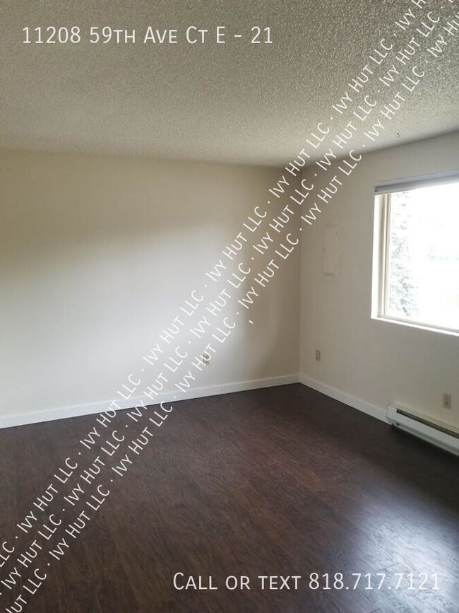 Building Photo - 11208 59th Ave Ct E Unit 21