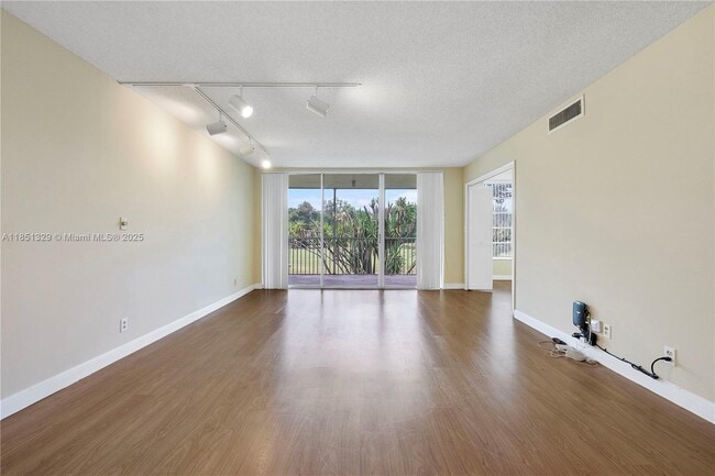 Building Photo - 3351 S Palm Aire Dr Unit 205 Rental