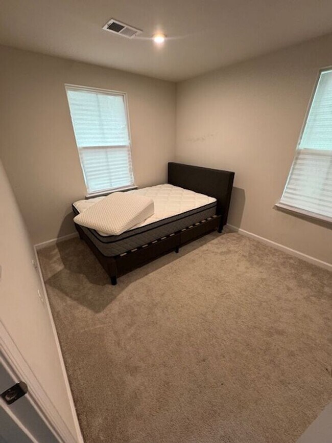 Photo - 4BR 3.5BA Townhome w/ 2-Car Garage • Quartz-Island Kitchen • Balcony in Matthews