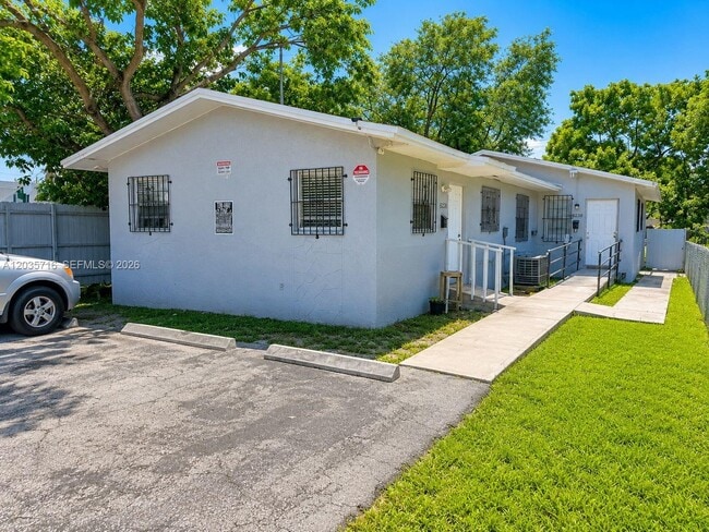 Building Photo - 6228 NW 4th Ave Unit 2