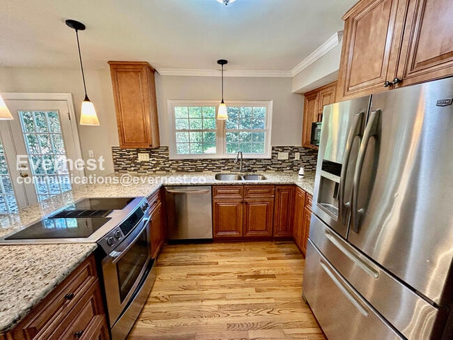 Photo - 3 Bed, 2.5 Bath Home with Fenced Yard & Garage / Pet-Friendly / Coming Soon!