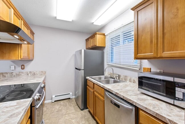 Photo - Spacious 2-Bedroom Condo with Garage and Basement
