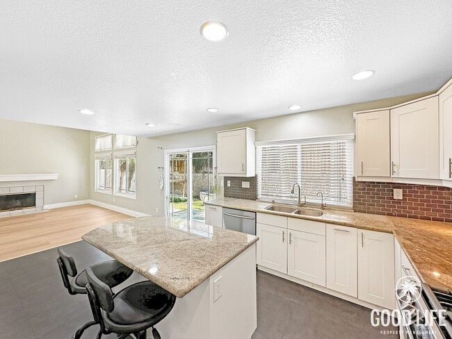 Photo - Beautiful 3-Bed Home w/ Vaulted Ceilings, Stainless Appliances, Private Backyard & 2-Car Garage