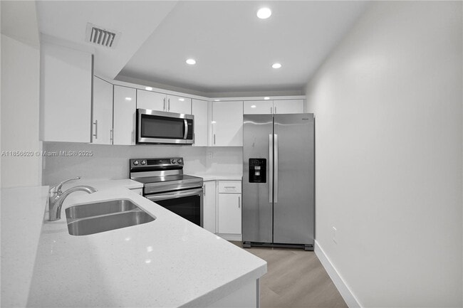 Building Photo - 9715 Fontainebleau Blvd Unit E108 Rental