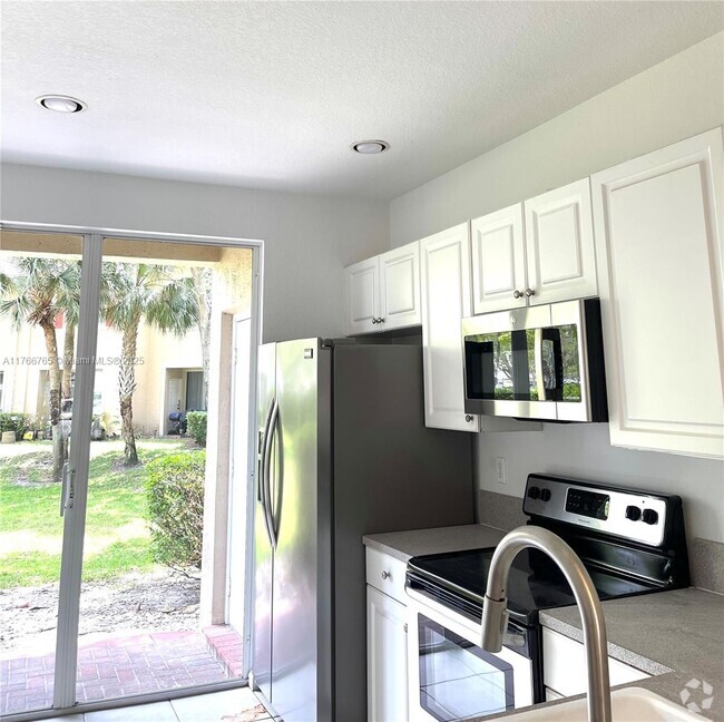 Building Photo - 795 NW 42nd Ave Rental