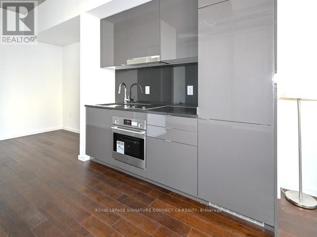 Photo - 21 Lawren Harris Square Unit 910