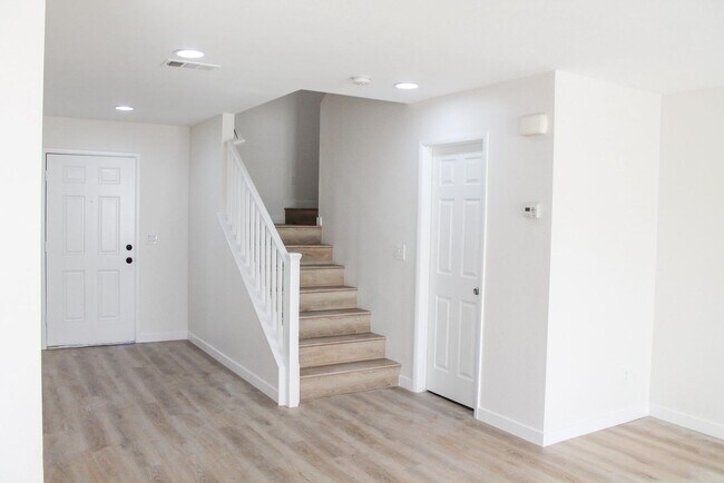 Photo - Gorgeous 4Bed/2.5Bath/2Car home located in North Las Vegas Raven Hill gated community!
