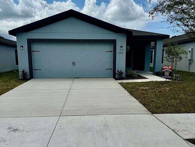 Photo - This almost new home is in the beautiful Crossings at Palm River Neighborhood, 5 minutes from 618...