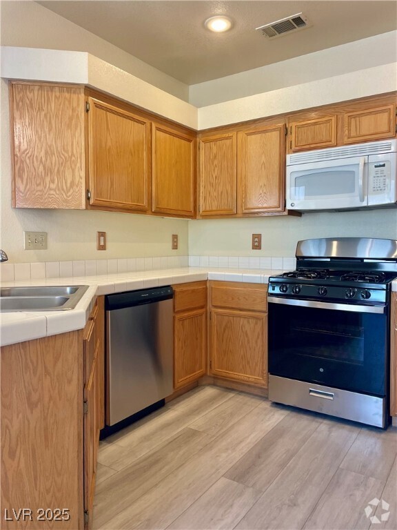 Building Photo - 5155 W Tropicana Ave Unit 2074 Rental