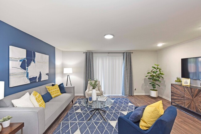 Living Room with Hardwood-Style Flooring - The Nelson Apartments