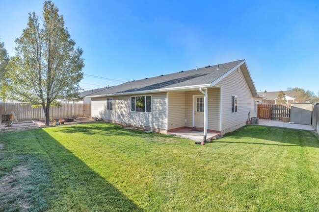 Photo - 3 Bed - 2.5 Bath, Beautiful Home in Ogden - Fully Fenced Yard! - Available on June 10th!