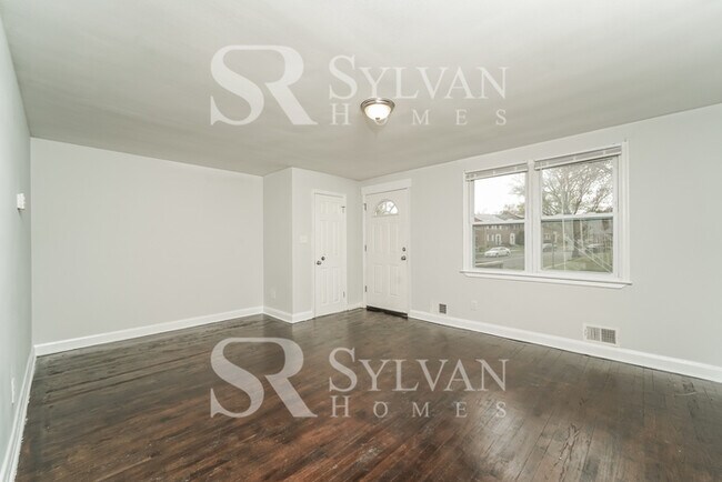 Photo - The living is easy in this 4 bedroom, 2 bathroom townhome