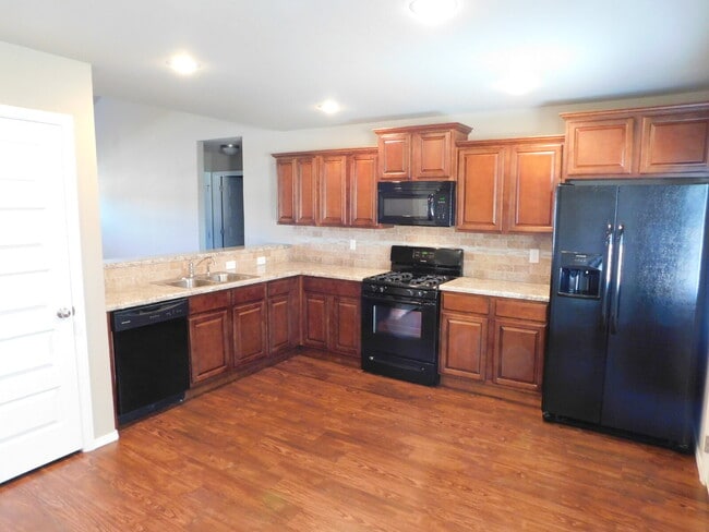 Photo - "Charming 3-Bed Retreat with Granite Touches & Gleaming Hardwood Floors in Fayetteville"