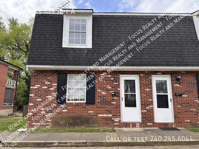 Building Photo - 220 Marks Ave Unit A