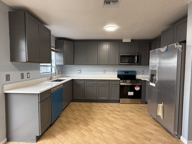 Building Photo - 6242 NW 1st St Rental