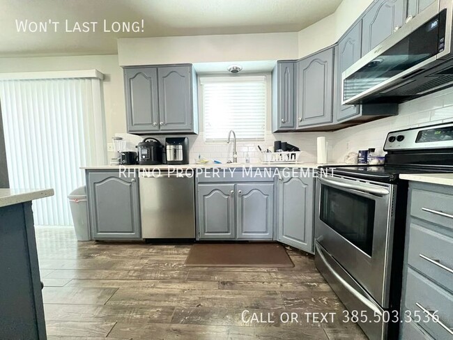 Photo - 5658 S Vlg Cir Apartment Unit Bedroom 1