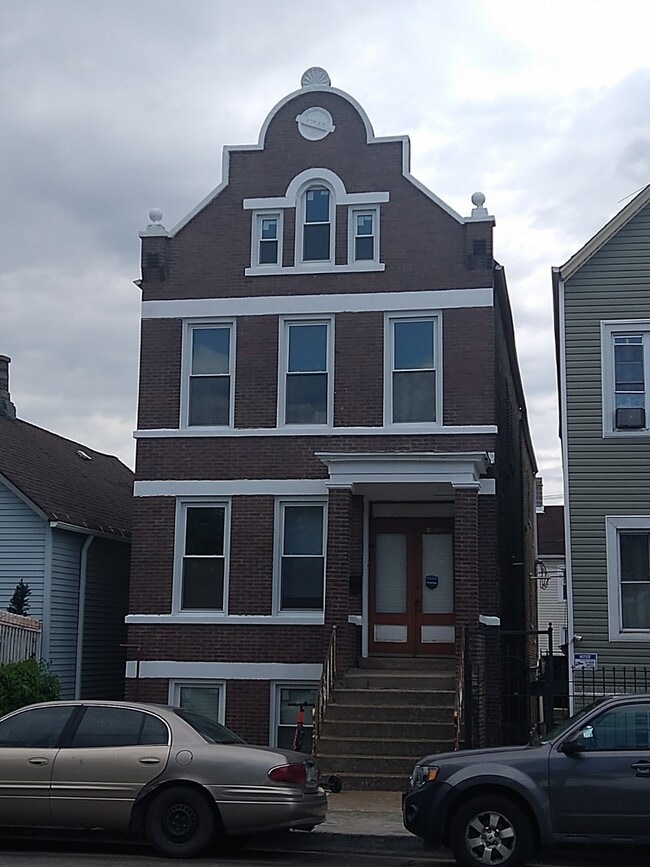 Building Photo - 2021 W 47th St Unit 1F