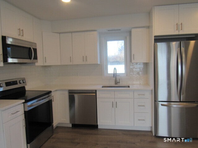 Building Photo - 10 Bouton St Unit C