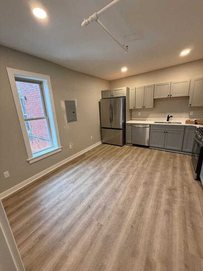 Building Photo - 127 W Michigan Ave Unit 127 F