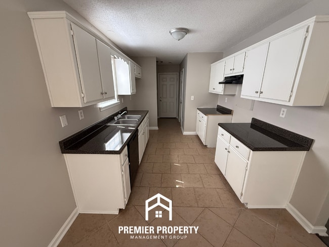 Photo - Move-In Ready 3BR Home in 38128 - Hardwood Floors, Attached Garage & Private Yard