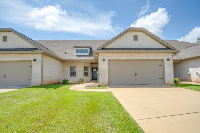 Building Photo - Spacious Cantonment Townhome with Open Layout, 2-Car Garage, Covered Back Porch & Easy Access to ...