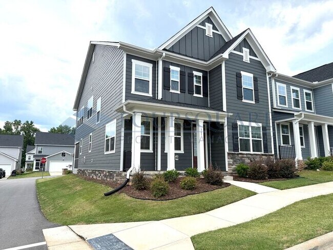Photo - Spacious Corner-Lot Home with Guest Suite, Screened Porch & Detached 2-Car Garage – Resort-Style ...