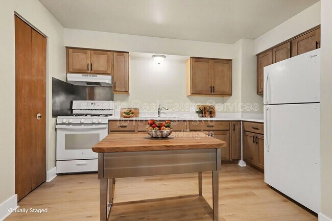 Building Photo - 1013 36th St SW Unit 4