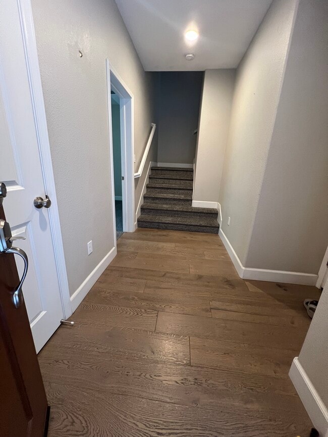 entrance from main door, garage on the right and room on the left - 2904 Worthing Cmn