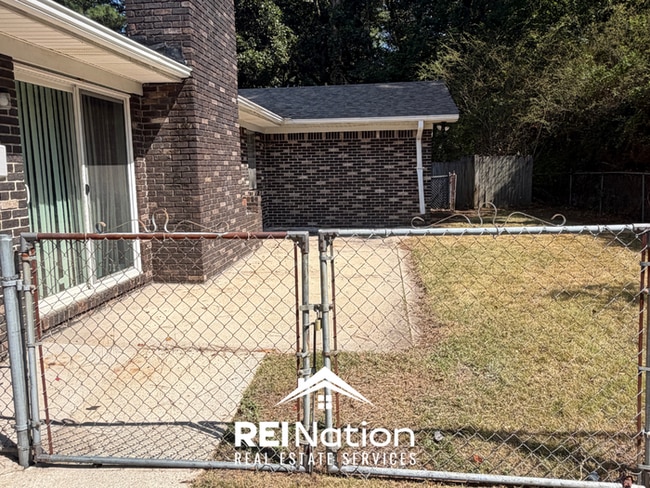 Photo - MASSIVE BESSEMER RENTAL! 4BR/2.5BA | High Ceilings & Brick Fireplace | 2-Car Garage!
