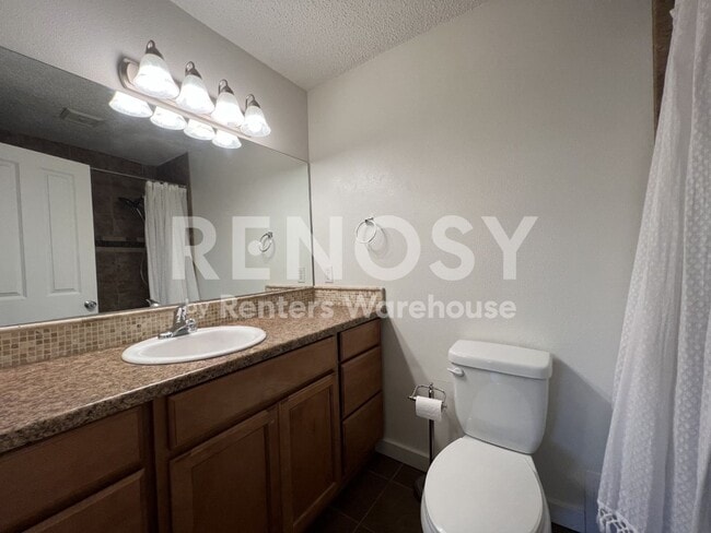 Photo - Poolside Living Awaits You - 1 Reserved Parking Stall and 1 storage unit Included