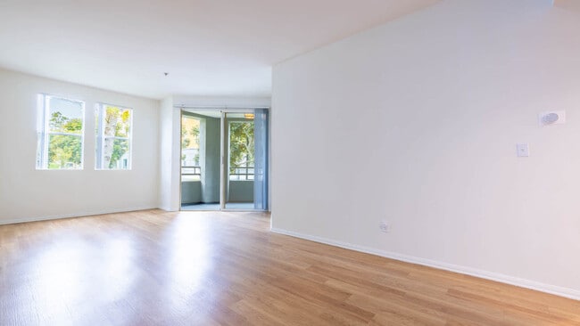 Living Room with Balcony and Hard Surface Flooring