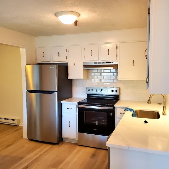 Kitchen with new quartz counters - 49 Spencer Rd Unit H 30