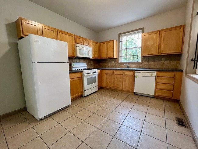 Photo - Stunning 6-Bedroom Townhome Steps Away from Temple! Available NOW! RENT SPECIAL - One Month FREE ...