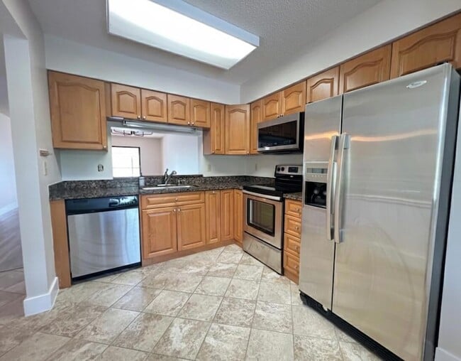 Building Photo - 7320 Amberly Ln Unit 207