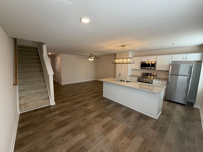 Photo - Modern Two-Story Townhome with Open Floor Plan and Garage