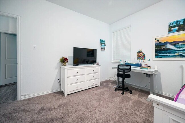 Photo - Stylish 4-bedroom home with quartz kitchen, luxury flooring, covered patio, and resort-style amen...