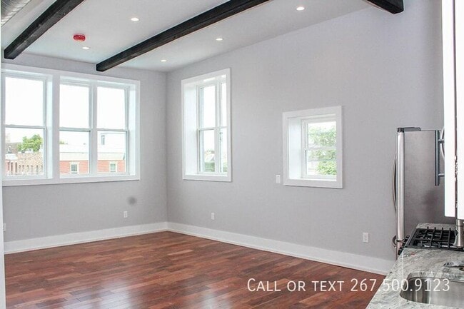 Building Photo - 1025 E Montgomery Ave Unit 4