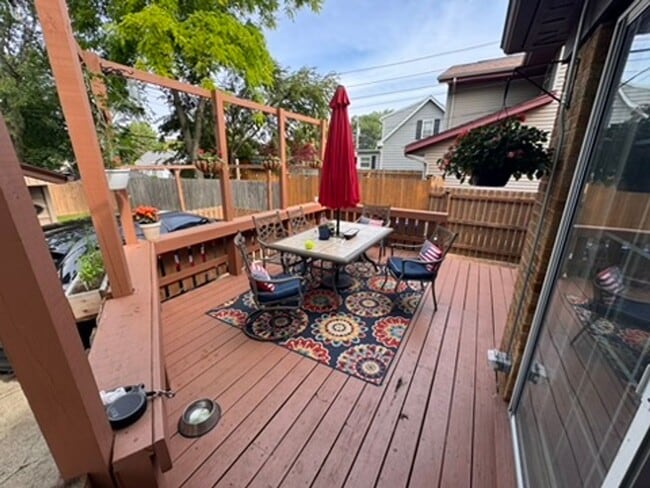 Photo - AVAILABLE SEPTEMBER 1: Updated 4-bedroom single family home on a quiet block- with 2 kitchens, 2 ...