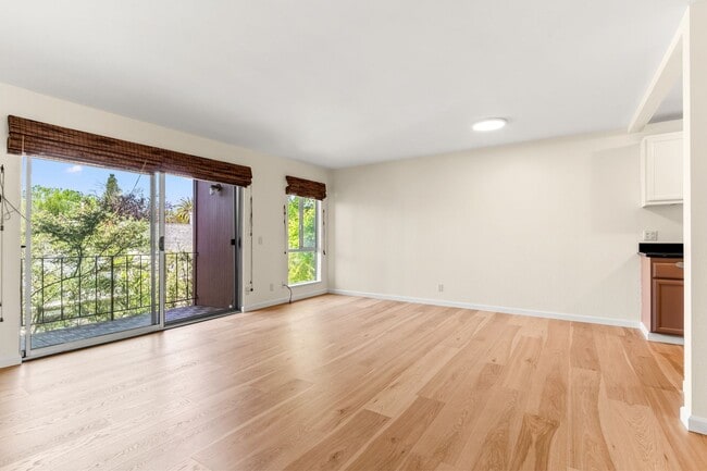 Photo - Modern Oakland Living: New Floors, Private Balcony, and Parking