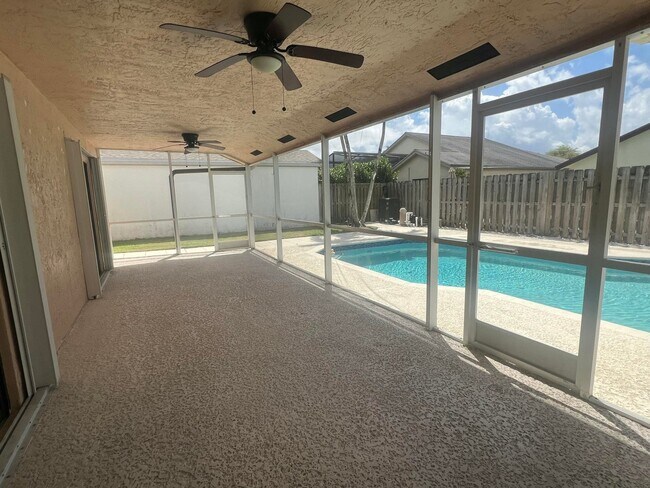 Photo - Rustlewood Avenue, Boca Raton, FL 33428 - 4 BR 2 BA single-family home