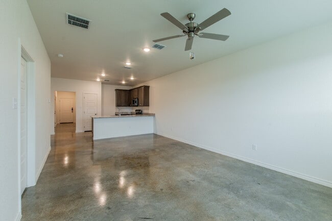 Photo - Brand New 3BR Duplex with Modern Concrete Floors & Fenced Yard! Unit B