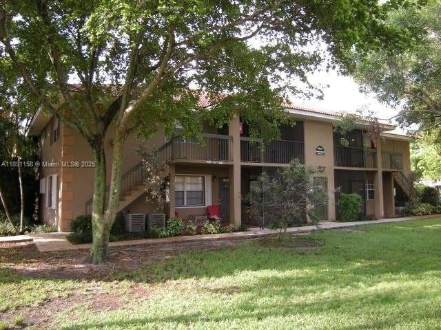 Building Photo - 10480 NW 8th St Unit 201