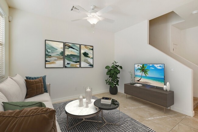 Living Room adjacent to dining area and kitchen for a more family friendly space