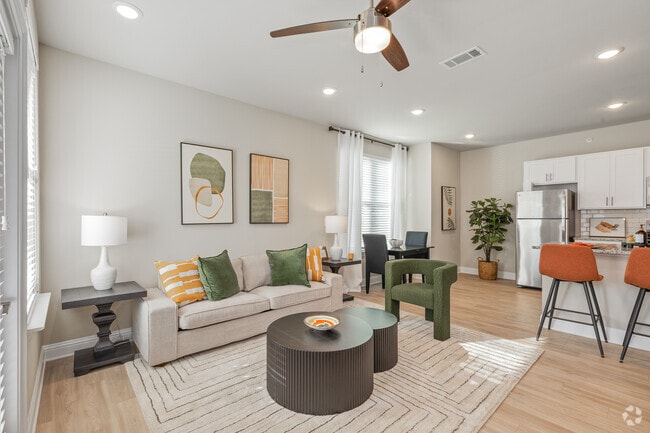 The Cape: 1BA, 1BR- Living Room - Flats at East Bay