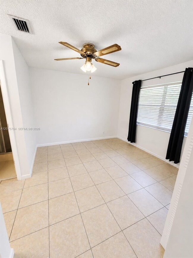 3280 NW 102nd Terrace Unit 203-E