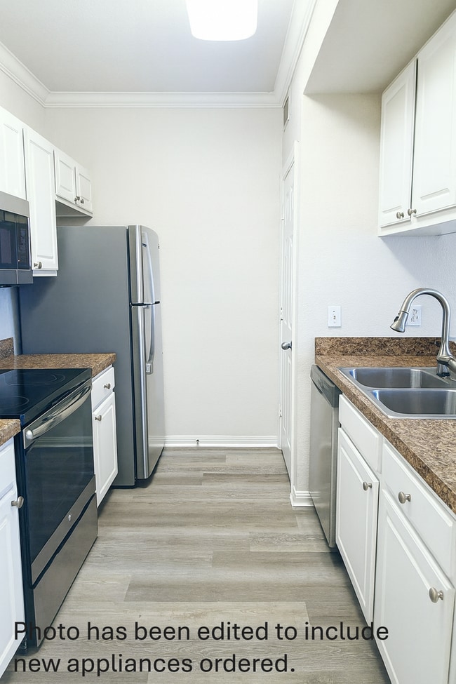 Photo - $500 rent credit December move-in special. Updated, clean 1x1 New floors, appliances, washer/dryer!