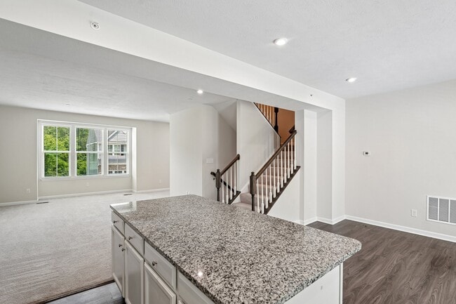 Kitchen looking into family room