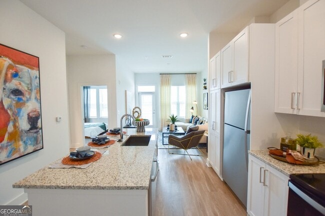 Building Photo - 2620 Mall of Georgia Blvd Unit 1246 Rental