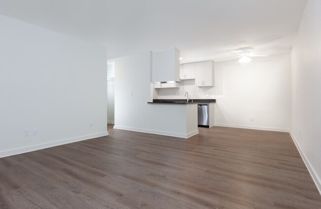 Living area and kitchen with hard surface flooring